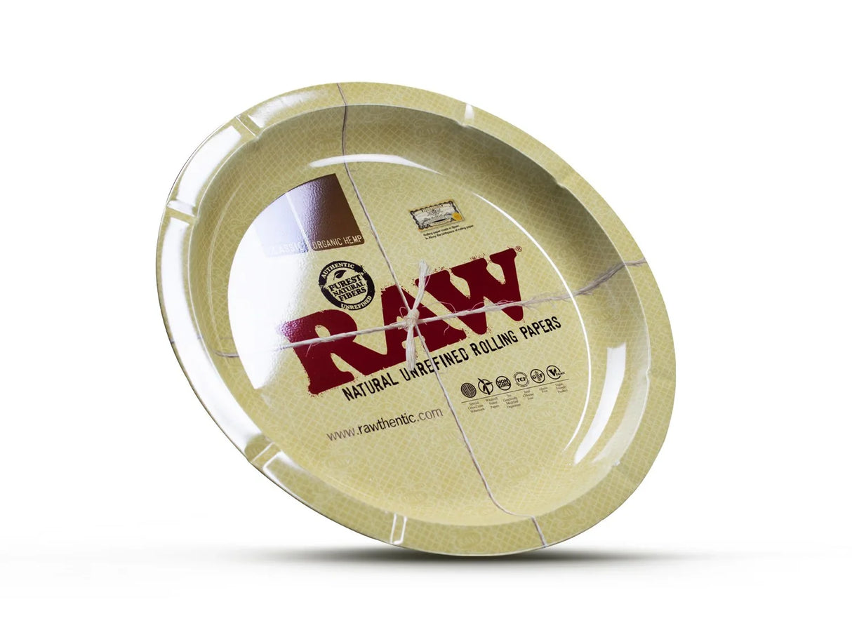 Bandeja redonda RAW metálica color beige con logo grande para liar papel de fumar